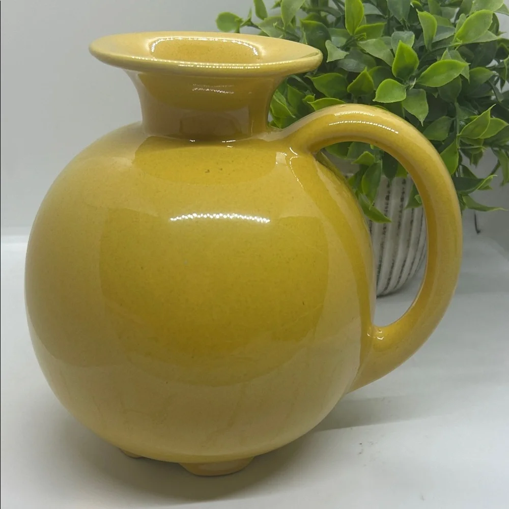 Frankoma Pottery Yellow MCM #82 Carafe dating back to the 1950s.
